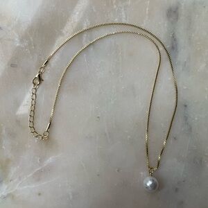Imitation Pearl (Vegan) necklace on a 18 inch adjustable gold chain.